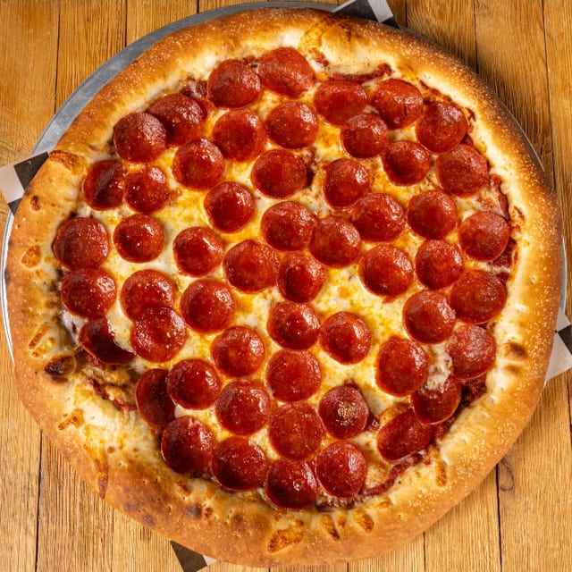 DOUBLE PEPPERONI-DOUBLE CHEESE PIZZA.